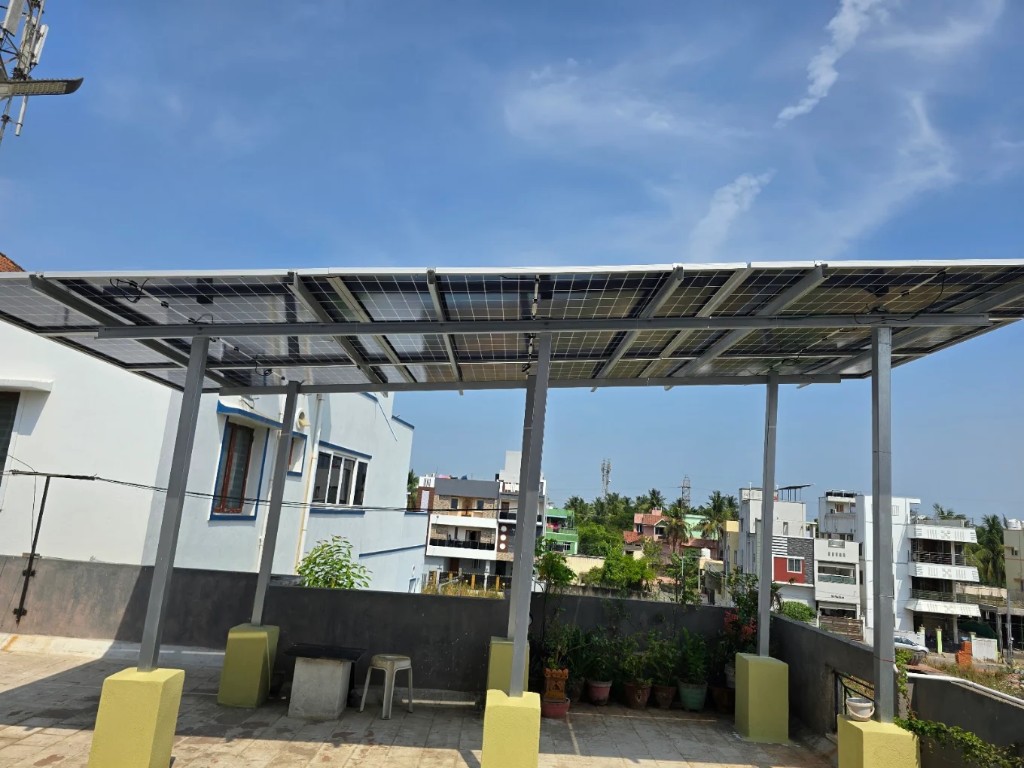ZeroEB team installing solar panels on a residential roof