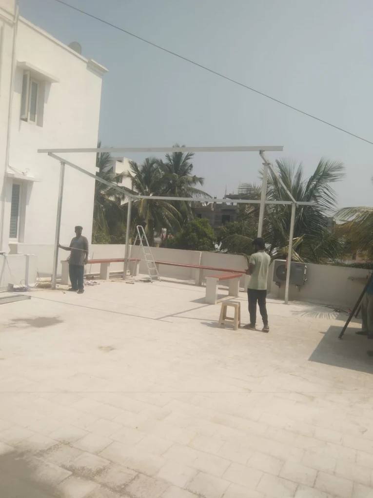 Completed solar panel system on a blue rooftop