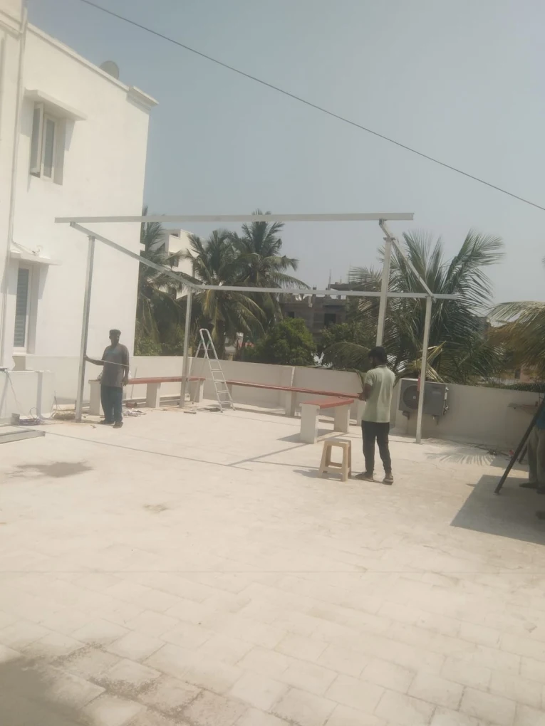 Completed solar panel system on a blue rooftop