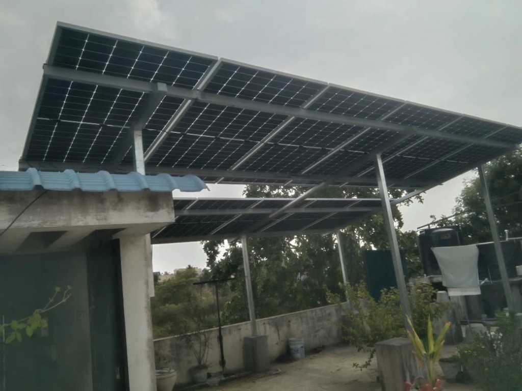 ZeroEB crew assembling rooftop solar structure