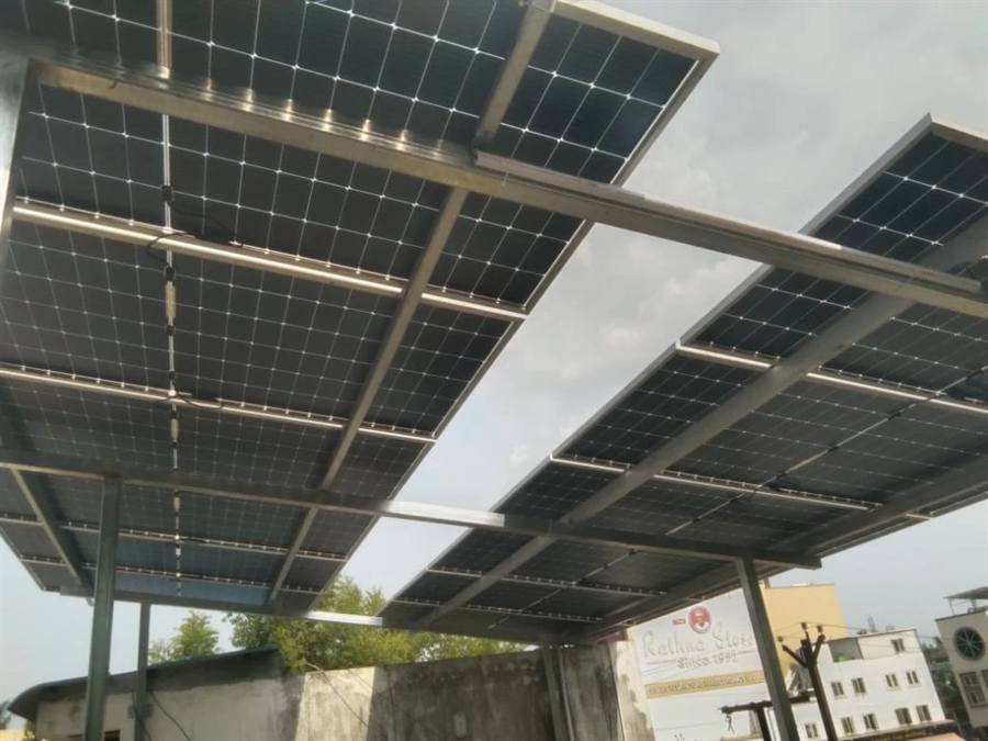 Cable tray routed under solar rooftop panels